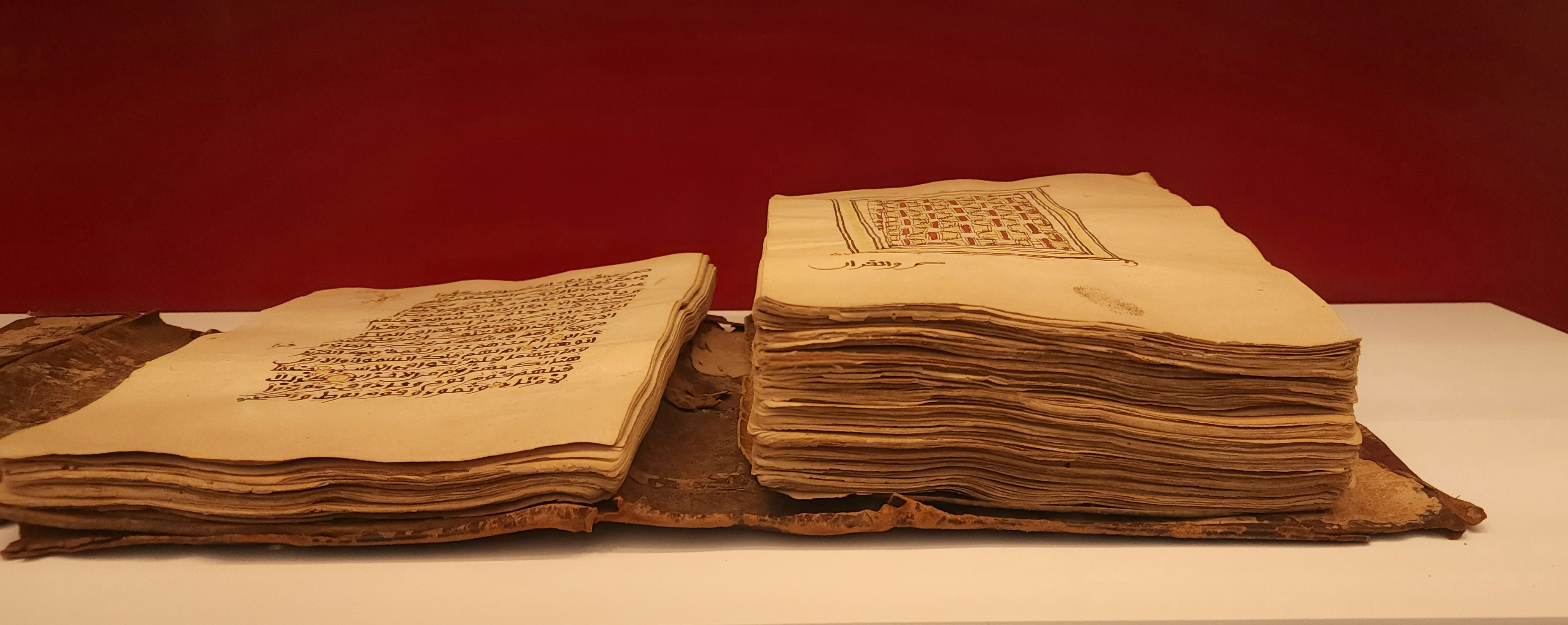 Aged auction house provenance documents, ink stamps, chain of custody records on cream paper